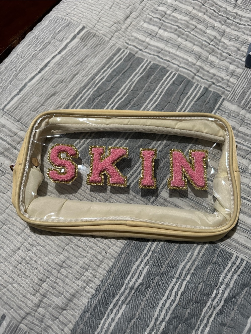 Source Unknown Clear Cosmetic Pouch with Pink 'SKIN' Letters and Cream Trim